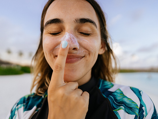 girl wearing sunscreen