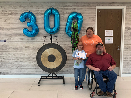 Proton patient, Correy Bozeman, with family