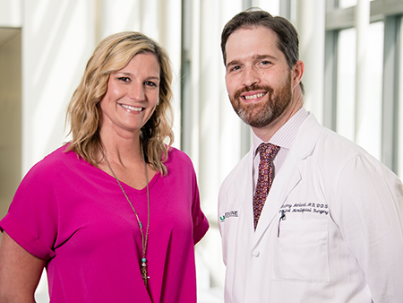 Anthony Morlandt, M.D., DDS, FACS, associate professor and chief in the section of Oral Oncology in UAB OMFS and associate scientist in UAB’s O’Neal Comprehensive Cancer Center with patient Stacy Wooten