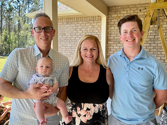 Oral cancer survivor Matthew Snowden with his family