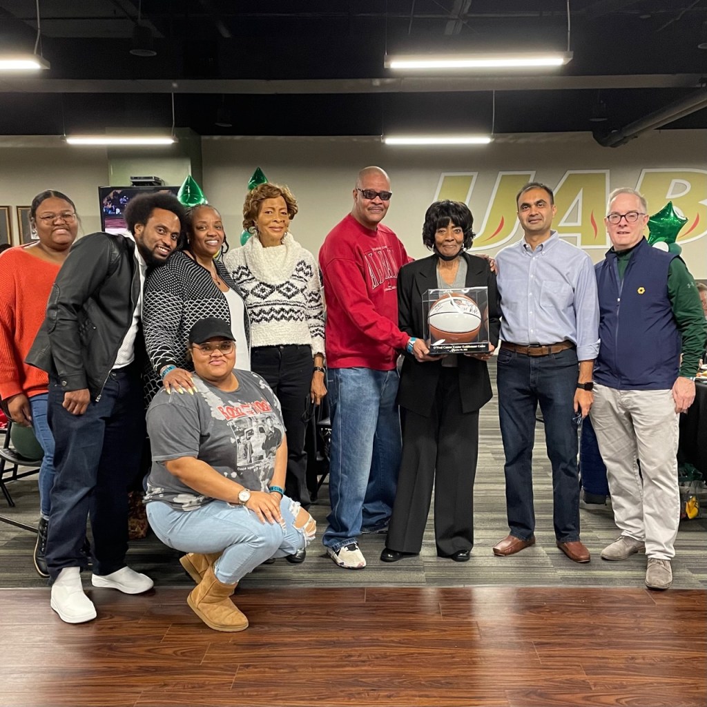 UAB presented Lonon and her family and friends with a game ball from the UAB Blazers contest against South Alabama.