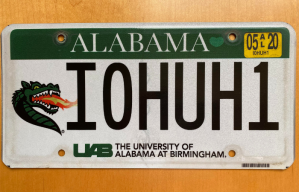 Cancer survivor Leslie Hamilton thanks Dr. Huh with an unusual license plate