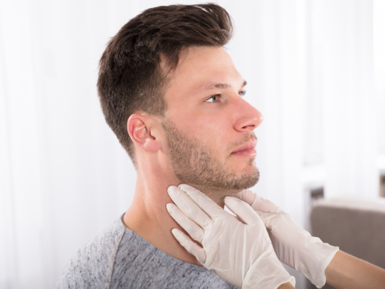 Man receiving a free neck screening