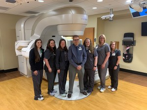 Team in the TrueBeam treatment room at the Kirklin Clinic at Acton Road