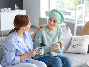 Breast cancer patient receiving comfort from a loved one