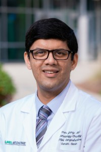 Professional headshot of Omer Jamy, MD