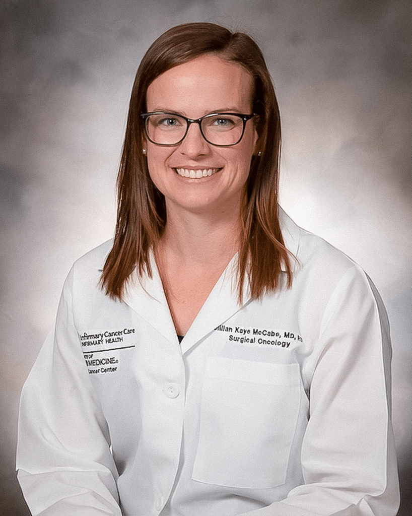 A doctor in a white lab coat and glasses; Jillian McCabe, M.D., R.D.
