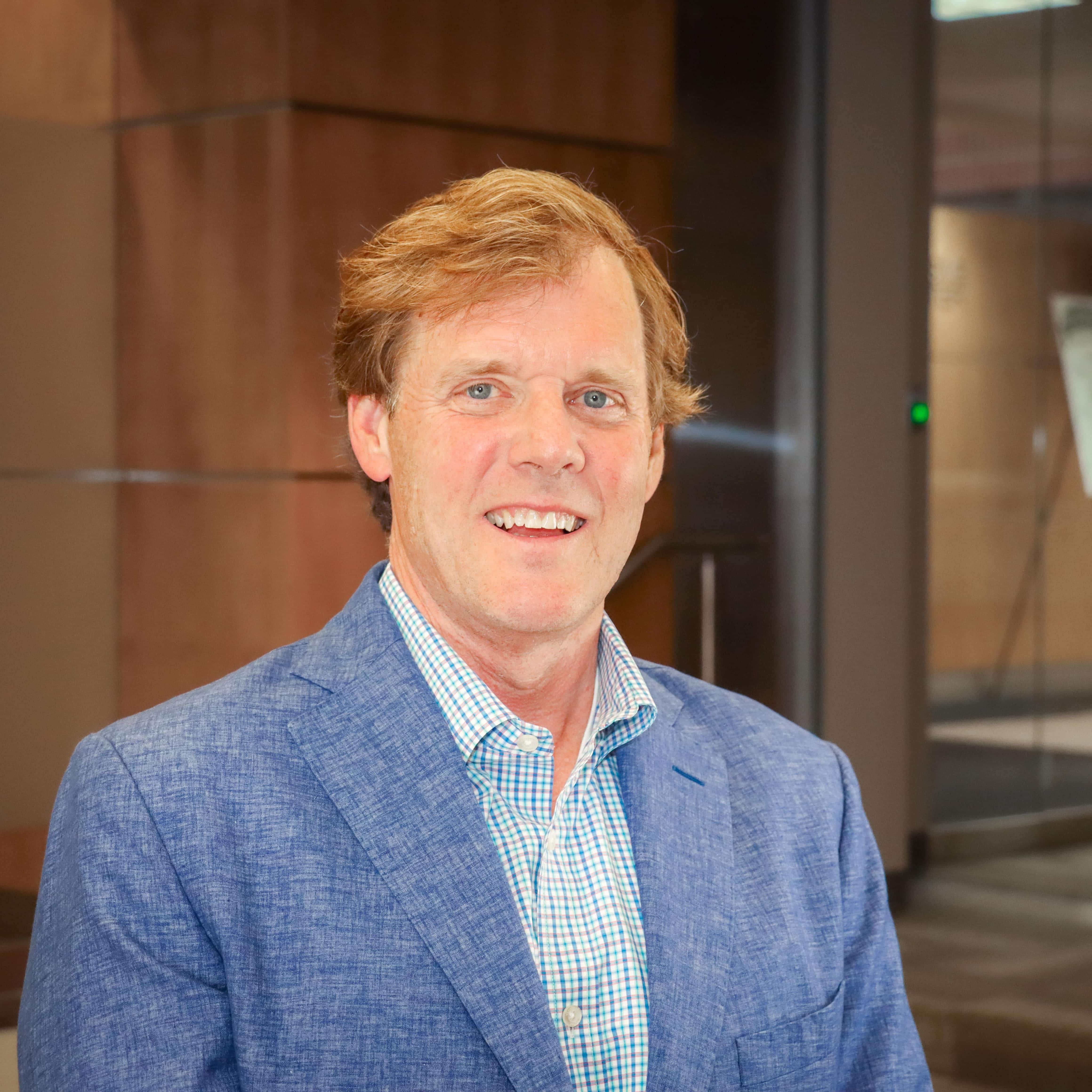 James Procotor, a 2026 Iron Strong Awardee, stands inside the Wallace Tumor Institute.