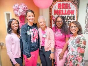 UAB faculty and staff from both the Office of Community Outreach and Engagement and the O'Neal Cancer Center's breast cancer team at the 2026 Pink Party.